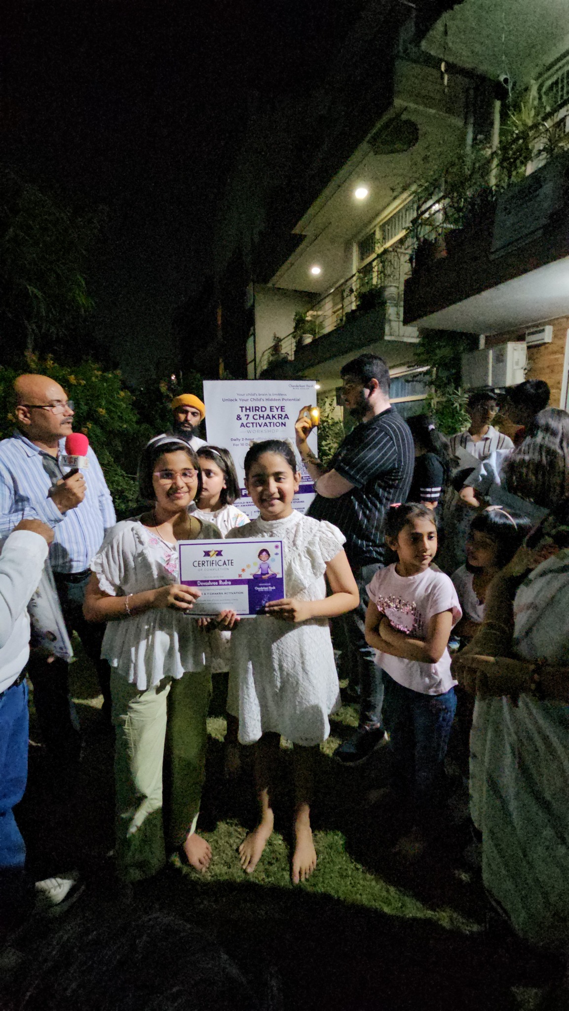 Participants holding a workshop completion certificate